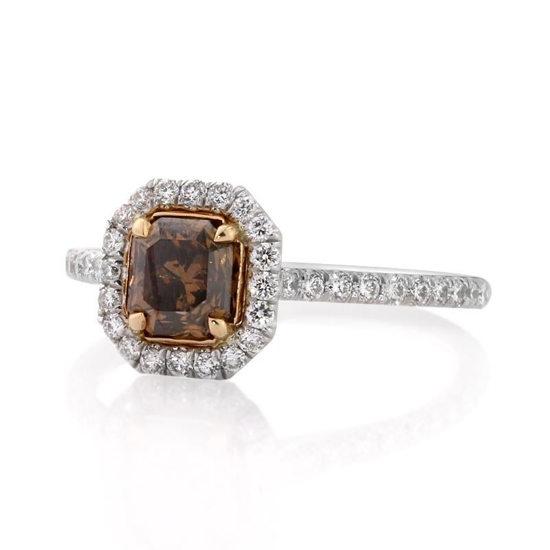This elegant fancy colored diamond engagement ring features a unique 1.01ct radiant cut center diamond, GIA certified at fancy dark orange brown-I1. It is beautifully hand set in a rose gold basket and accented by a sparkling halo of white, round