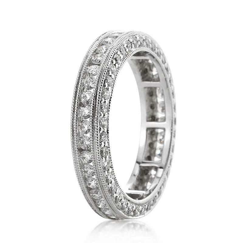 This exquisite diamond eternity band features 1.75ct of round brilliant cut diamonds graded at E-F, VS1-VS2. They are beautifully matched and hand set in 18k white gold. All eternity bands are shown in a size 6.5. We custom craft each eternity band