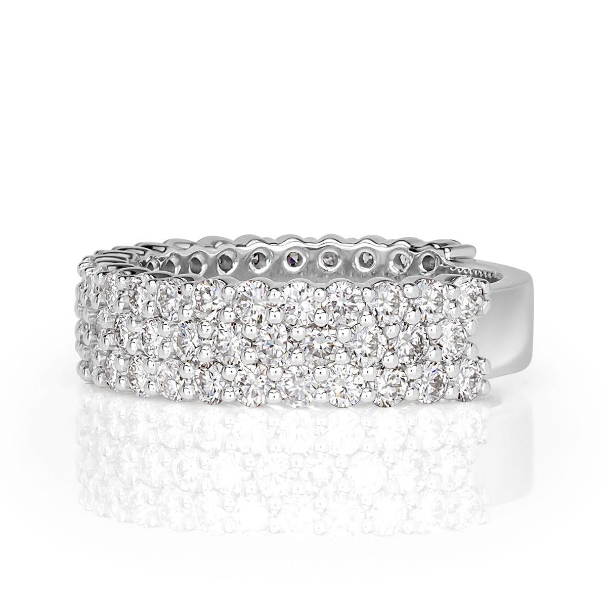 This shimmering, three-row diamond band showcases 1.85ct of seamlessly matched round brilliant cut diamonds set in 18k white gold. The diamonds are graded at F-G in color, VS1-VS2 in clarity.