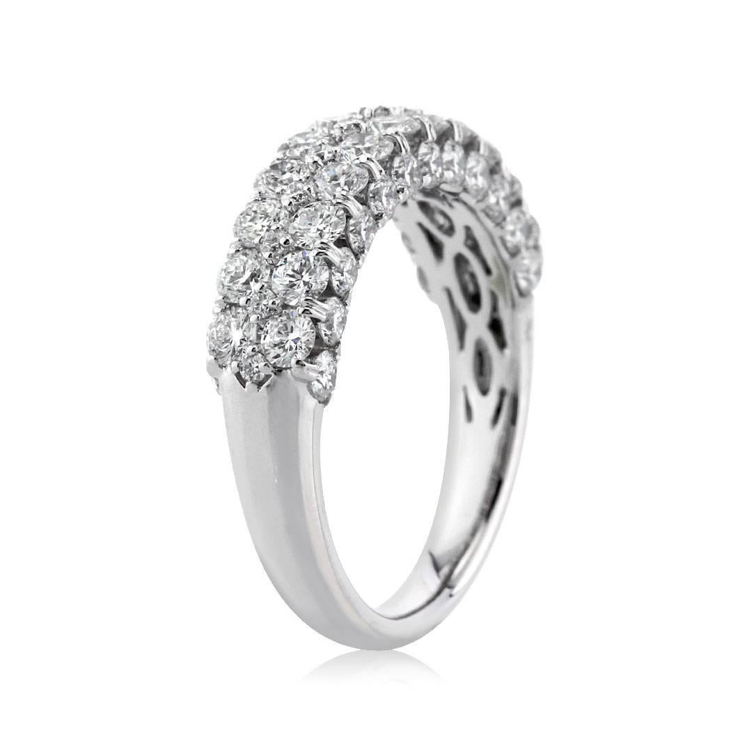 This two-row micro pave ring features 2.00ct of round brilliant cut diamonds set on high polish 18k white gold. They are perfectly matched and graded at E-F, VS1-VS2. All eternity bands are shown in a size 6.5. We custom craft each eternity band and