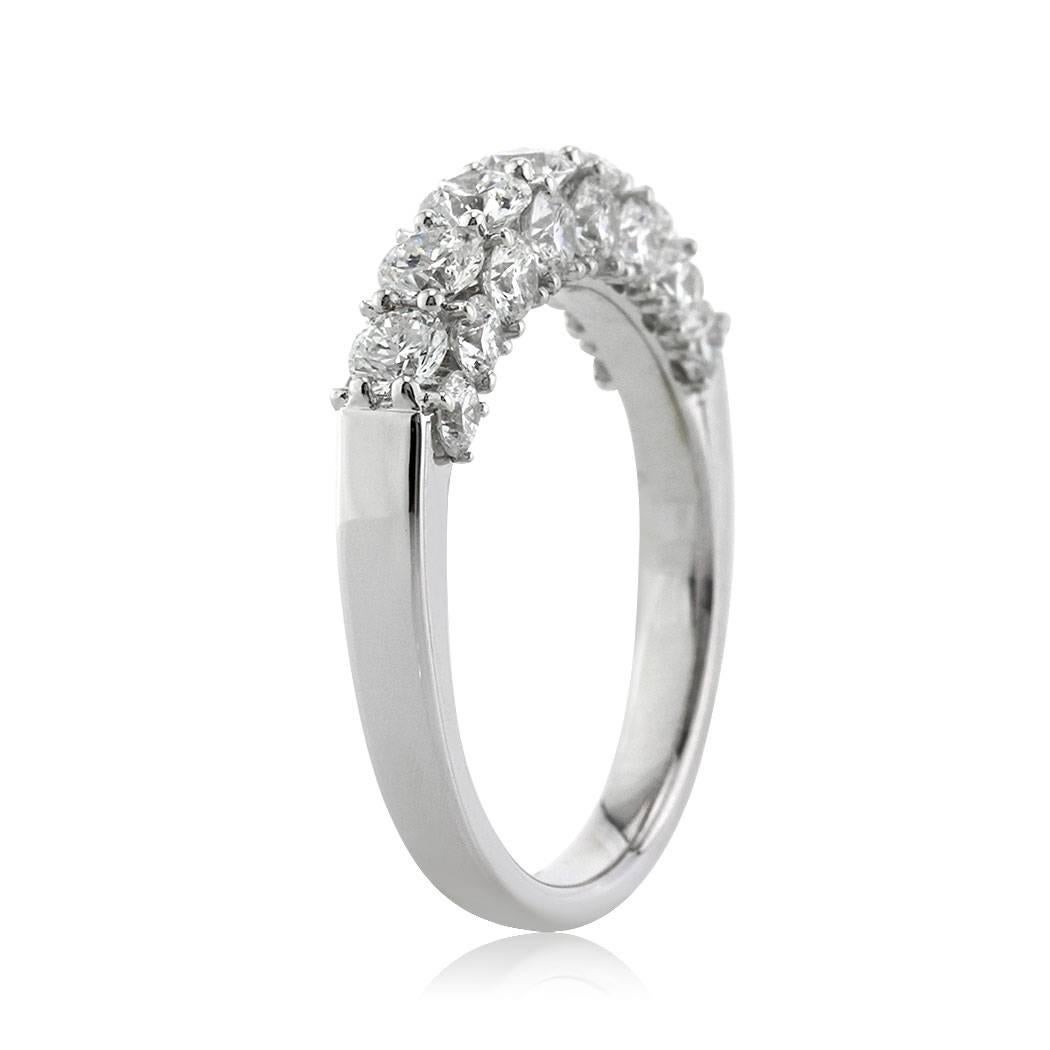 This diamond wedding ring features 2.00ct of round brilliant cut diamonds micro pavé set in high polish 18k white gold. The diamonds are impeccably matched and graded at E-F, VS1-VS2. All eternity bands are shown in a size 6.5. We custom craft each