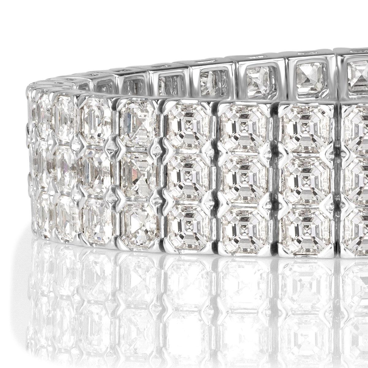 This stunning diamond bracelet features a whopping 21.72ct of Asscher cut diamonds graded at E-F in color, VVS2-VS1 in clarity. Impeccably hand set in high polish 18k white gold they appear to float on the wrist. 
