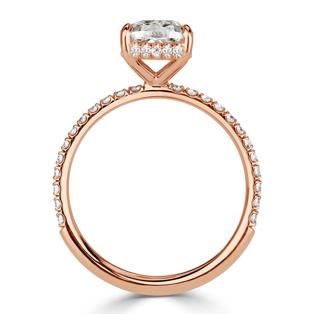 Created to perfection in our custom 18k rose gold, this one of a kind diamond engagement ring showcases a stunning 2.03ct old Mine cut center diamond, GIA certified at J-VVS2. It measures at an incredible 10.03 x 7.02mm which make it look much