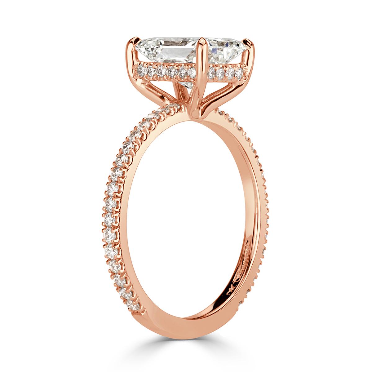 Extraordinarily brilliant and beautiful, this stunning radiant cut diamond engagement ring features a 2.00ct center diamond, GIA certified at H in color, VS2 in clarity. It is graded at excellent in both polish and symmetry in addition of having