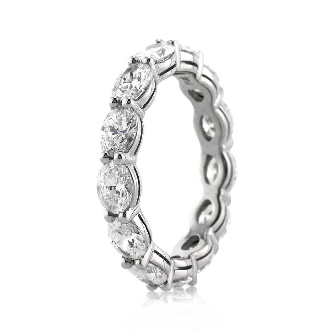This stunning diamond eternity band features 2.50ct of oval cut diamonds set in a shared prong platinum setting. The diamonds are graded at E-F, VS1-VS2. All eternity bands are shown in a size 6.5. We custom craft each eternity band and will create