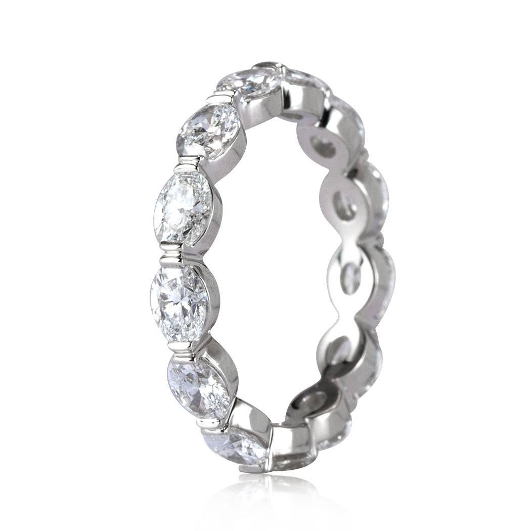 This beautiful diamond eternity band is set with 2.60ct of oval cut diamonds graded at E-F, VS1-VS2. They are set end to end on the split prong, platinum setting. All eternity bands are shown in a size 6.5. We custom craft each eternity band and