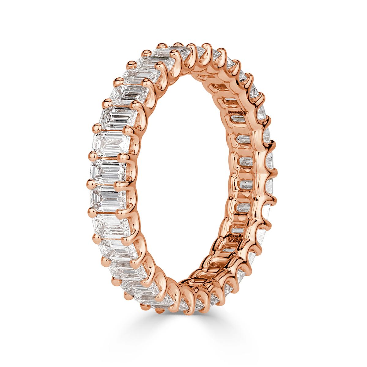 This ravishing diamond eternity band showcases 2.66ct of perefctly matched emerald cut diamonds graded at E-F, VVS2-VS1. They are incredibly white and clear, each hand set in a custom 18k rose gold, 