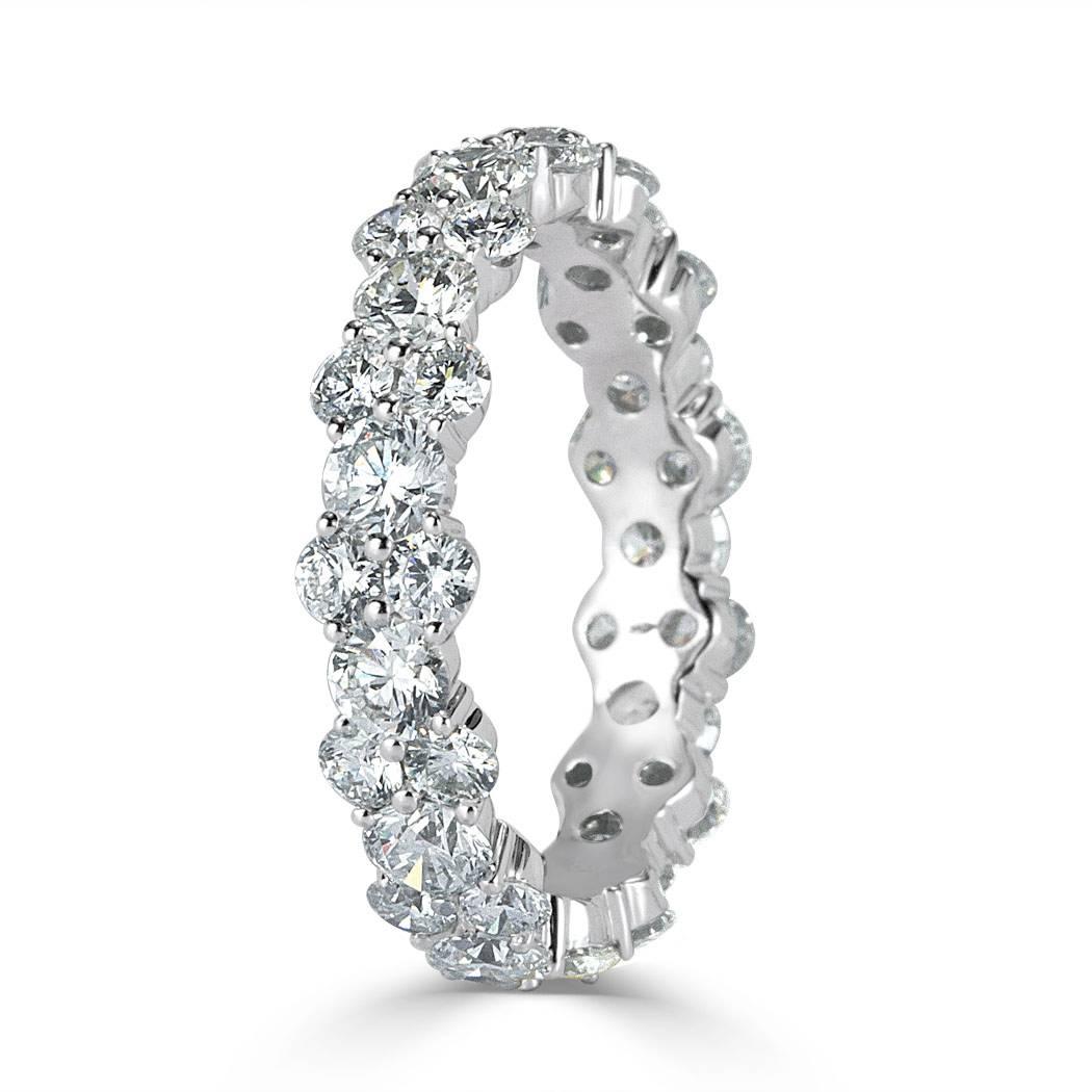 This gorgeous diamond eternity band showcases 3.05ct of round brilliant cut diamond graded at E-F, VS1-VS2. They are impeccably matched and hand set in 14k white gold. All eternity bands are shown in a size 6.5. We custom craft each eternity band