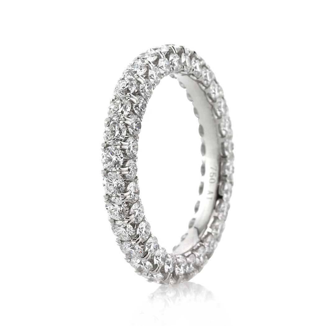 This three-sided diamond eternity band features 3.25ct of round brilliant cut diamonds graded at E-F, VS1-VS2. All eternity bands are shown in a size 6.5. We custom craft each eternity band and will create the same design for you in your desired