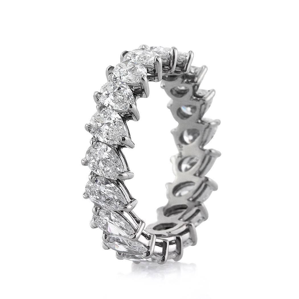 This stunning diamond eternity band features 3.65ct of pear shaped diamonds graded at E-F, VS1-VS2. All of the diamonds are exquisitely matched and hand set in platinum. All eternity bands are shown in a size 6.5. We custom craft each eternity band