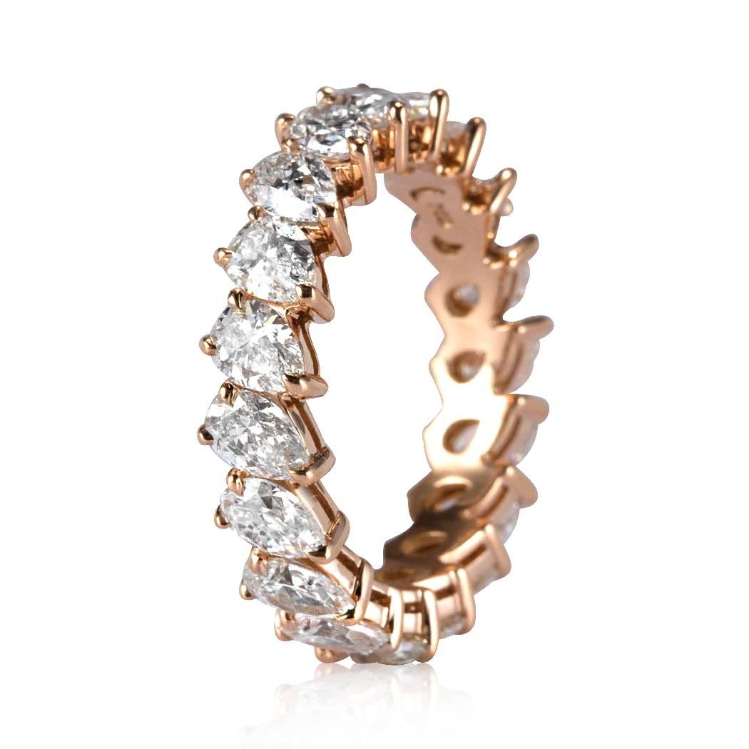 This stunning diamond eternity band is set with 3.65ct of perfectly matched pear shaped diamonds graded at E-F, VS1-VS2 and handset in 18k rose gold. All eternity bands are shown in a size 6.5. We custom craft each eternity band and will create the