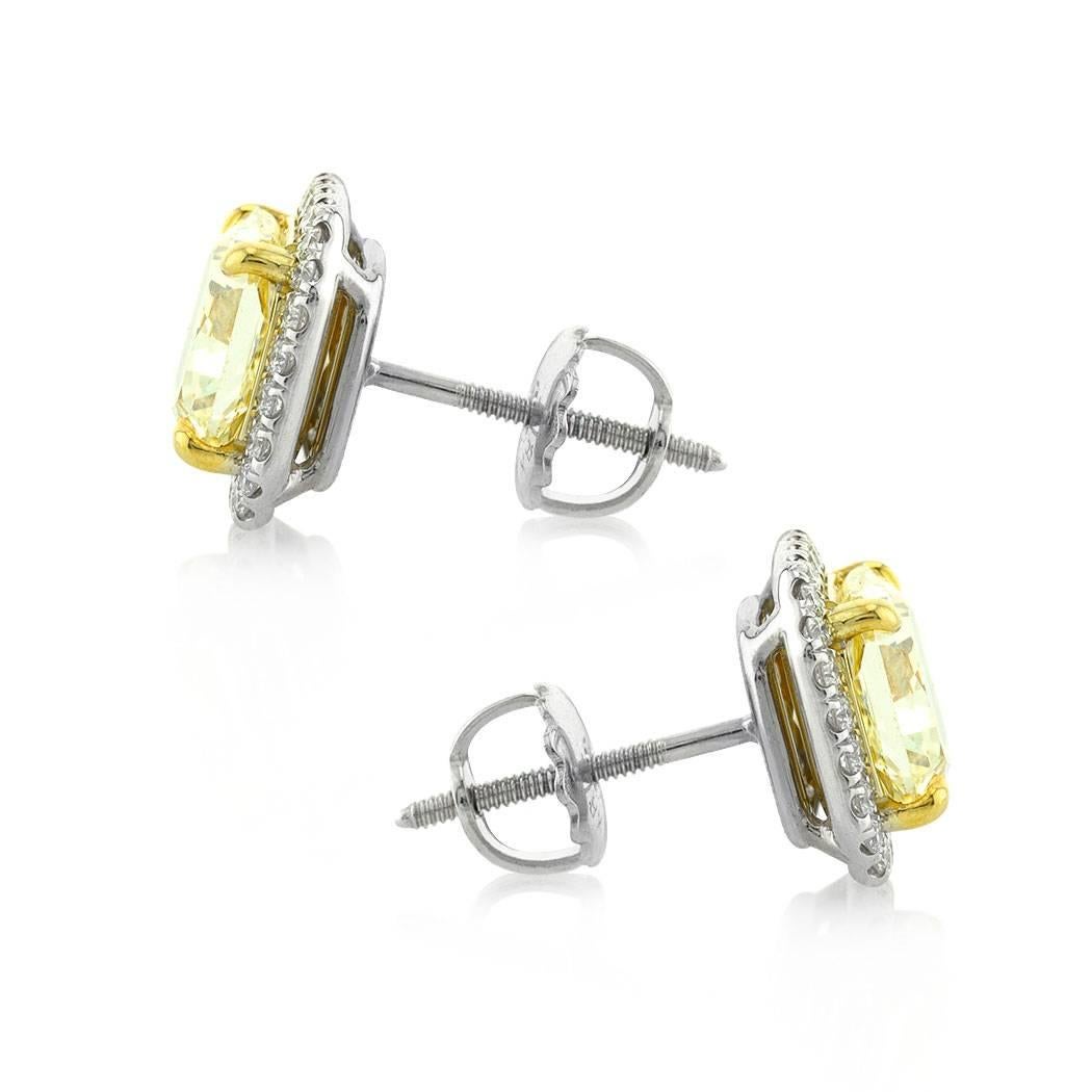 Modern Mark Broumand 3.86 Carat Fancy Yellow Radiant Cut Diamond Halo Earrings