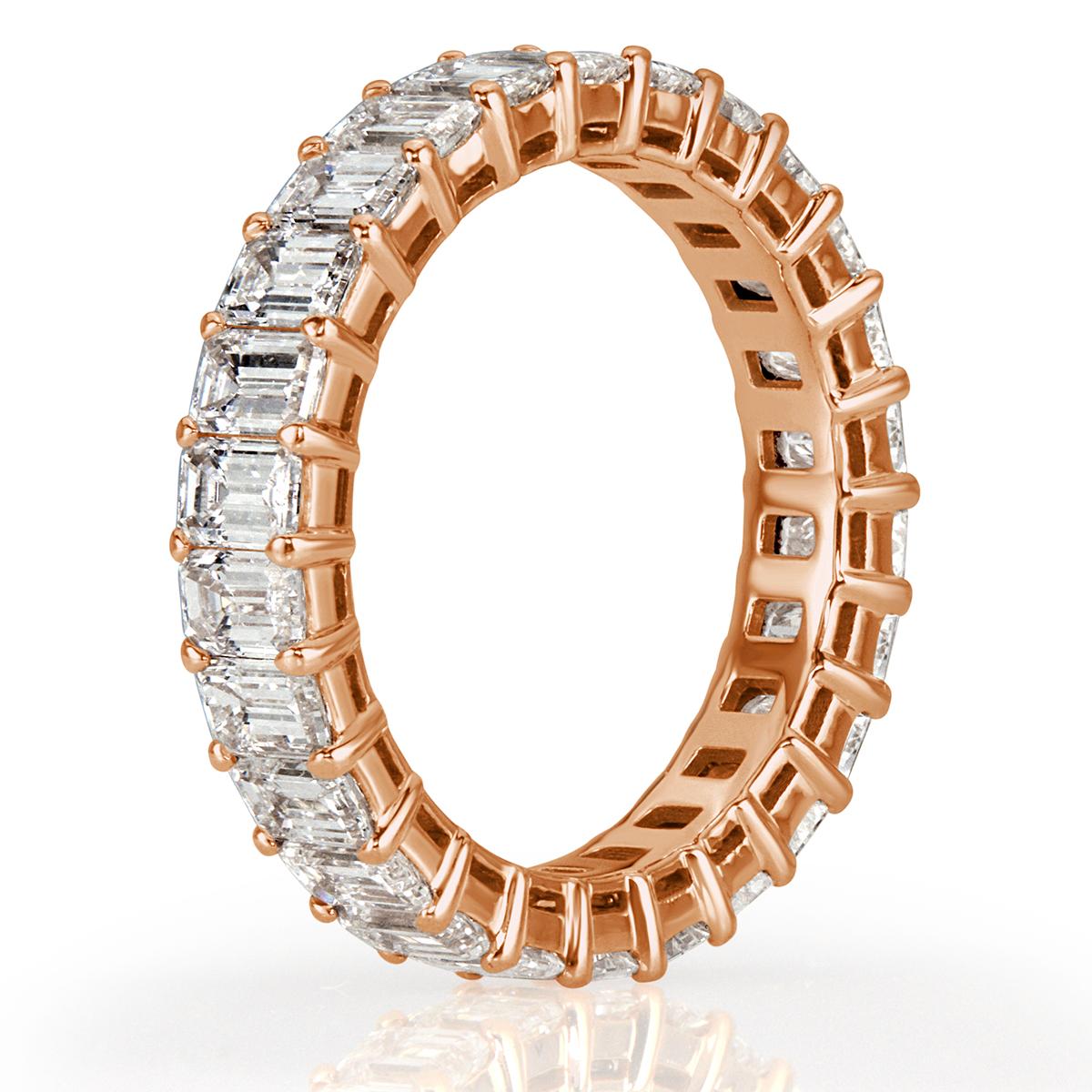 This gorgeous diamond eternity band showcases 4.00ct of perfectly matched emerald cut diamonds graded at E-F, VVS2-VS1. Each diamond is hand selected and beautifully showcased in this classic 18k rose gold setting. All eternity bands are shown in a