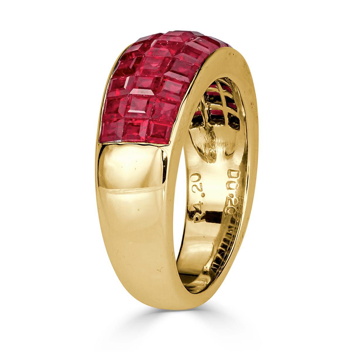 This gorgeous vintage ring showcases 4.20ct of square cut rubies hand set in 18k yellow gold. It has unparalled presence and exudes sheer elegance!
