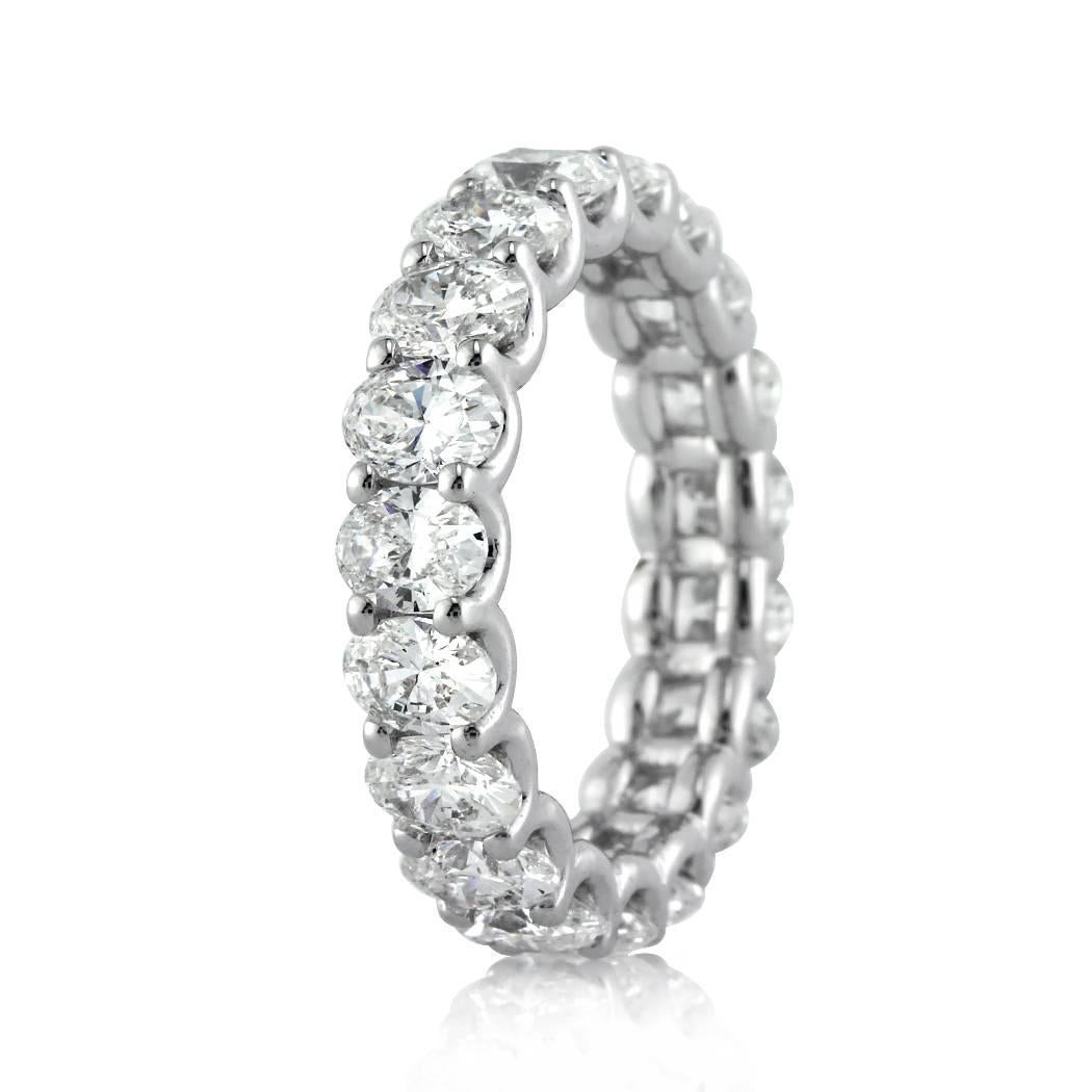 This gorgeous diamond eternity band features 4.55ct of perfectly matched oval cut diamonds graded at premium qualities of F-G, VS1-VS2. They are set in a custom 18k white gold 