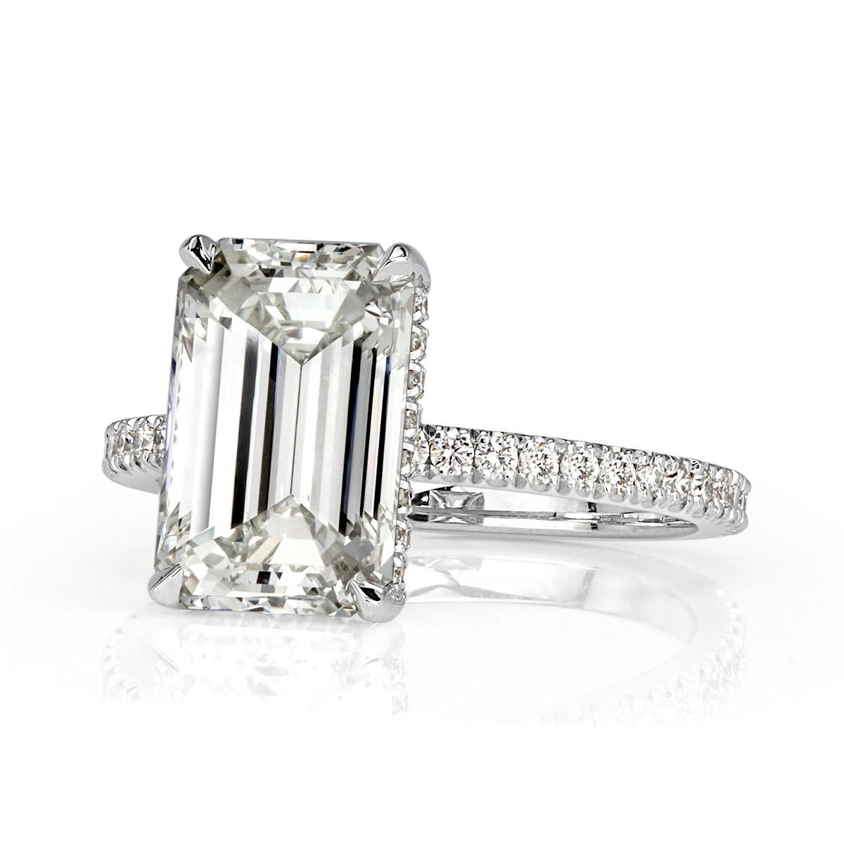 Absolutely gorgeous from every angle, this stuning diamond engagement ring features a superb 4.30ct emerald cut center diamond, GIA certified at I in color, VVS2 in clarity. It has exceptional measurements of 11.06 x 8.00mm and is graded at