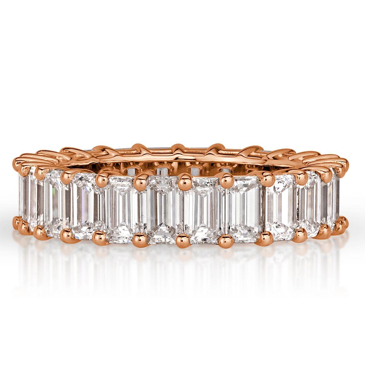 Handcrafted in 18k rose gold, this gorgeous emerald cut diamond eternity band features 4.87ct of seamlessly matched emerald cut diamonds graded at E-F colors, VVS2-VS1 clarities. All eternity bands are shown in a size 6.5. We custom craft each