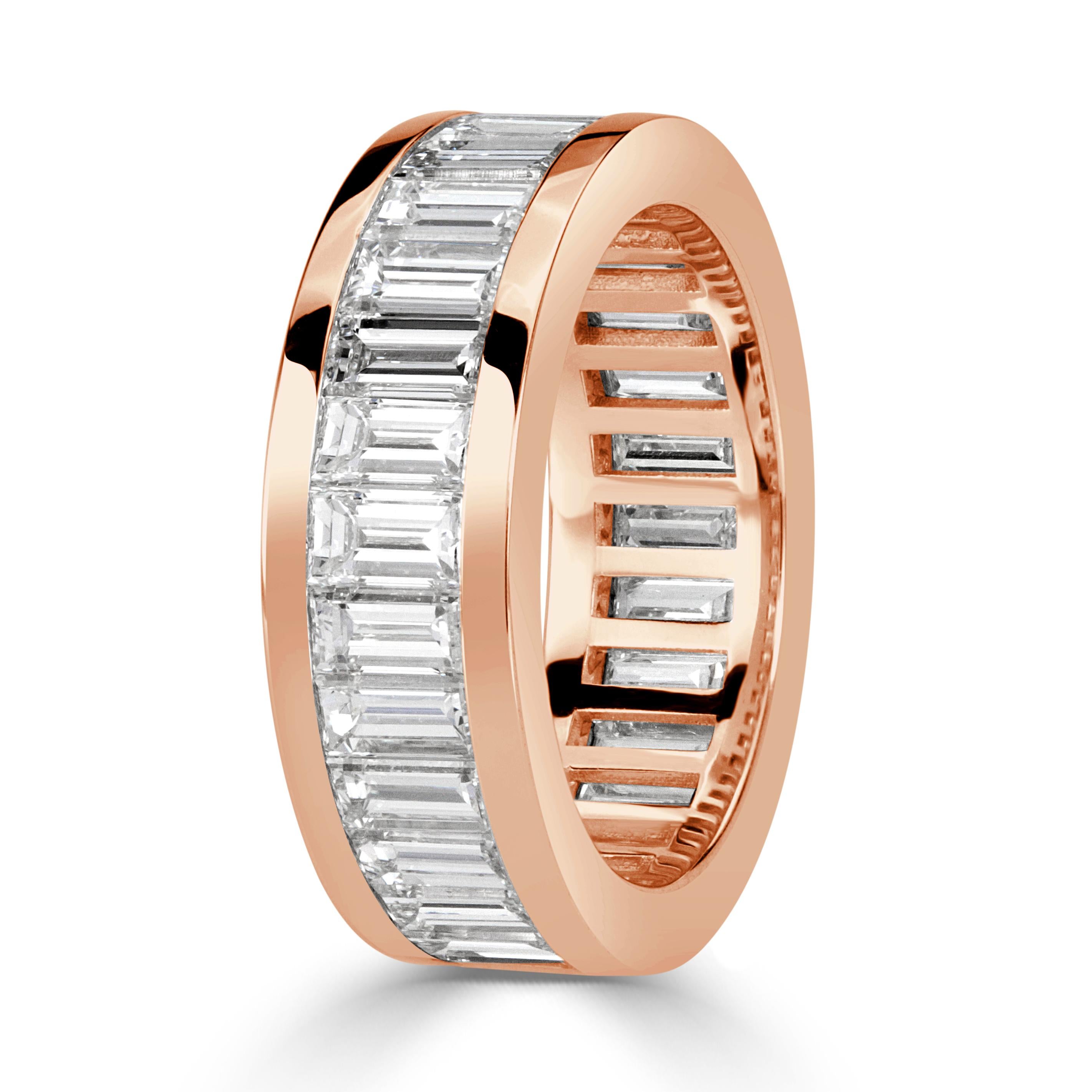 Custom created in 18k rose gold, this incredibly sleek eternity band features 4.97ct of channel set baguette cut diamonds graded at F-G, VVS2-VS1. They are incredibly white and clear with each of the diamonds being hand selected by Mark Broumand