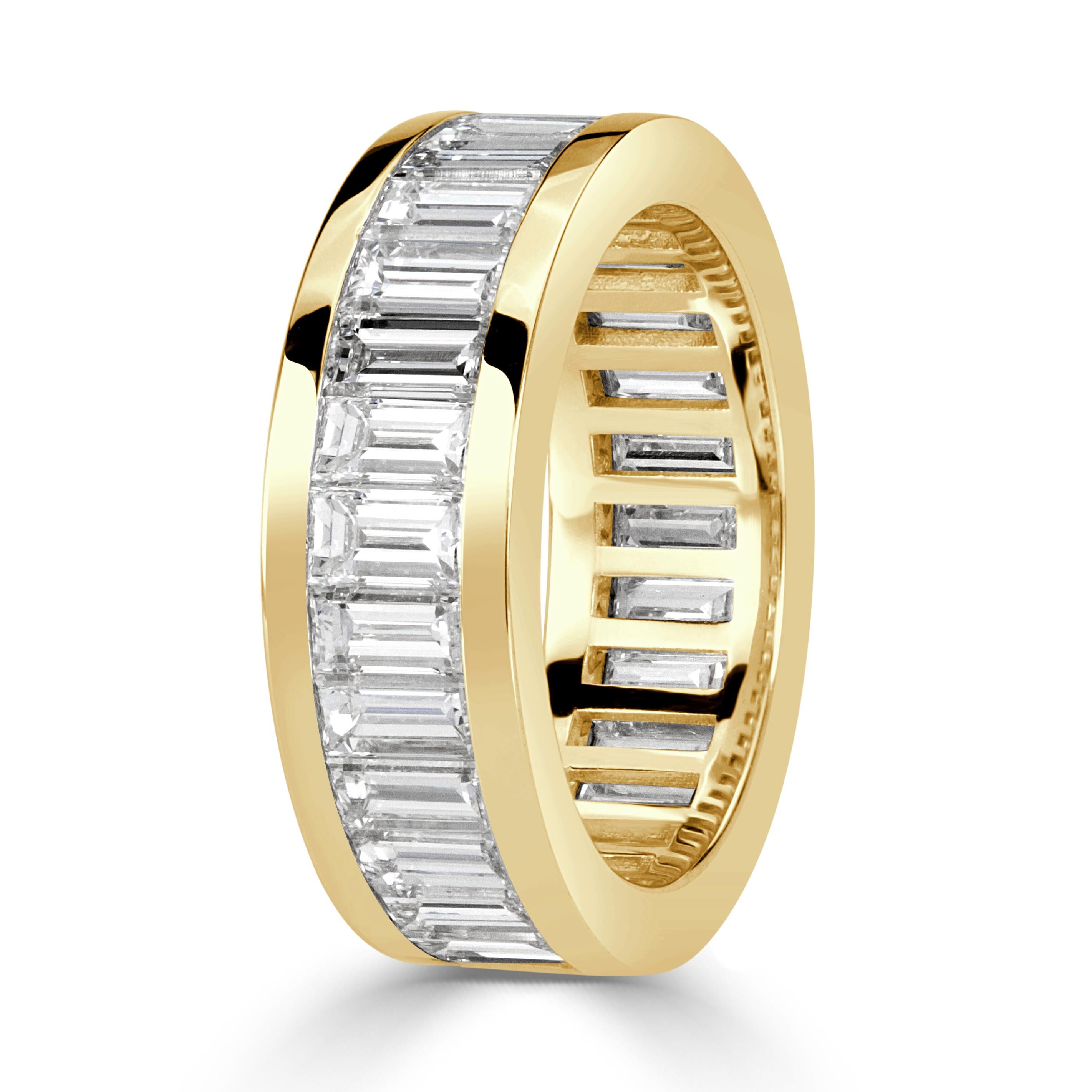 This stunning diamond eternity band showcases 4.97ct of baguette cut diamonds channel set to perfection in 18k yellow gold. Thay are graded at premium qualities of F-G in color, VVS2-VS1 in clarity. Absolutely perfect to wear as a stand alone piece