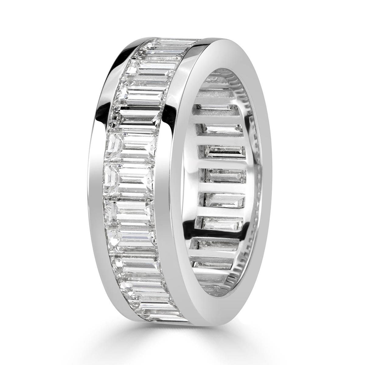 This gorgeous diamond eternity band showcases 4.97ct of perfectly matched baguette cut diamonds channel set in high polish platinum. The diamonds are each hand selected and graded at F-G in color, VVS2-VS1 in clarity. All eternity bands are shown in