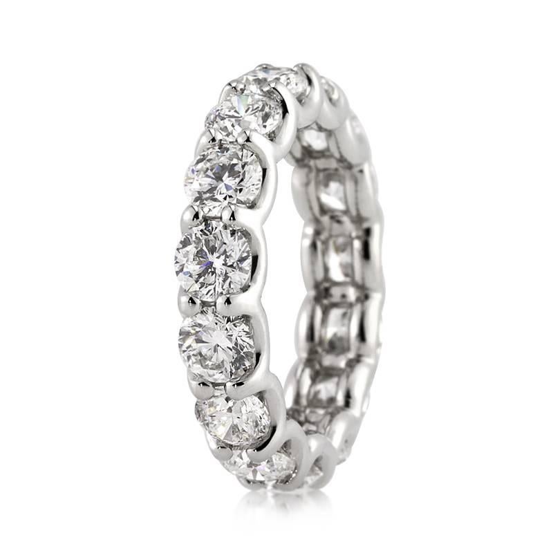 This beautiful diamond eternity band features 5.00ct of round brilliant cut diamonds graded at E-F in color, VS1-VS2 in clarity. The premium colored diamonds sparkle tremendously in this handcrafted platinum, 