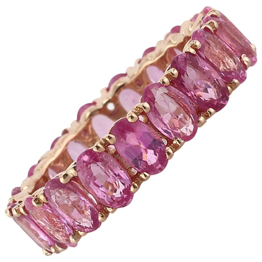 Mark Broumand, bague d'éternité en or rose 14 carats avec saphir rose de taille ovale de 5,00 carats en vente