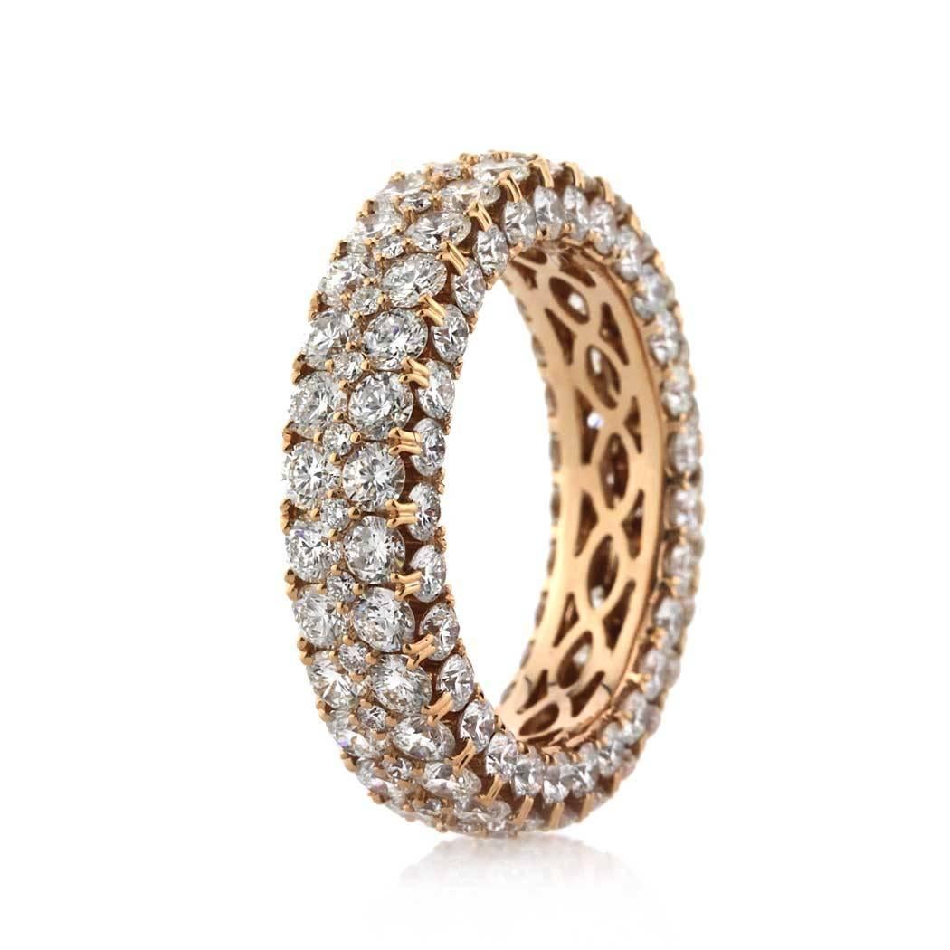 Custom created in 18k rose gold, this gorgeous diamond eternity band features 5.00ct of round brilliant cut diamonds graded at premium qualities of E-F, VS1-VS2. They are set on all three sides of the band for maximum sparkle. All eternity bands are