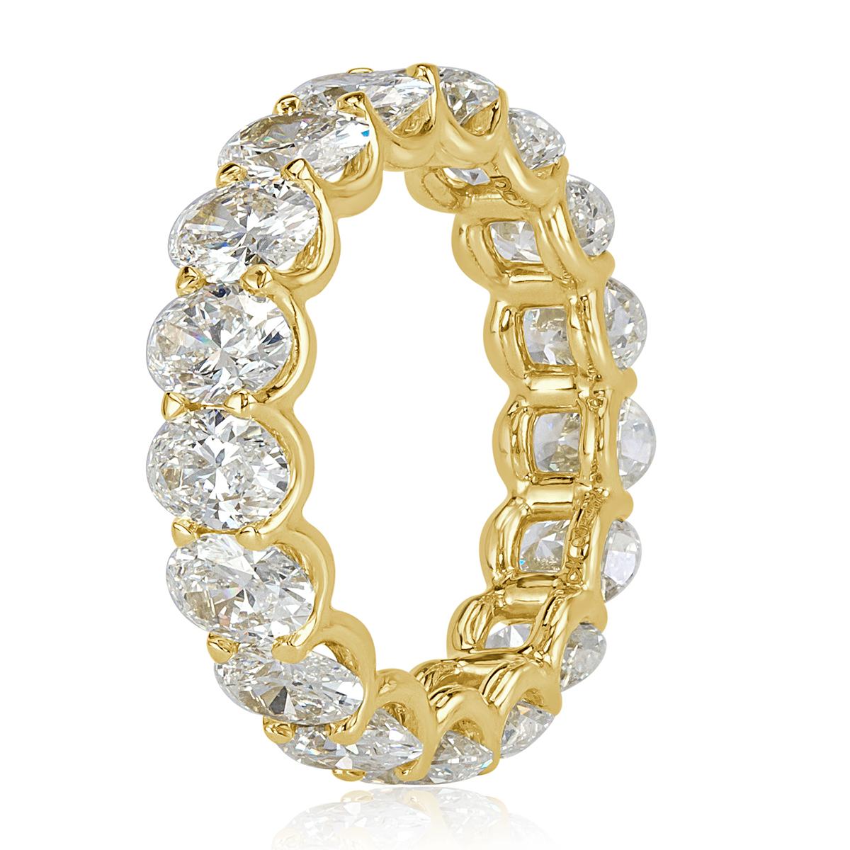 This striking diamond eternity band showcases 5.54ct of oval cut diamonds graded at E-F, VS1-VS2. The diamonds are beautifully matched and hand set in 18k yellow gold. All eternity bands are shown in a size 6.5. We custom craft each eternity band