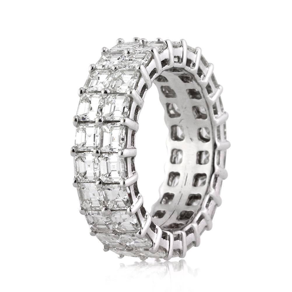 This stunning two-row diamond eternity band showcases 5.65ct of Asscher cut diamonds graded at G-H, VS1-VS2. They are each hand-selected and set in 18k white gold. All eternity bands are shown in a size 6.5. We custom craft each eternity band and