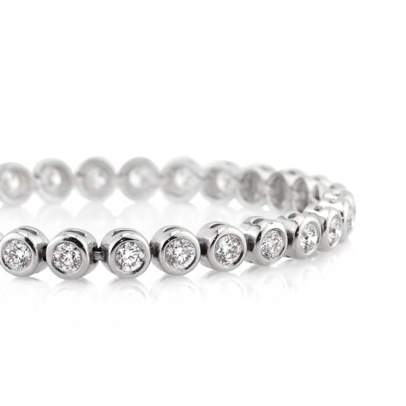 This classic tennis bracelet showcases 6.25ct of round brilliant cut diamonds. Set in 14k white gold, the diamonds are bezel set to match as a complete set and graded with E-F colors, VS2-SI1 clarities. it sits beautifully on the wrist stacked with