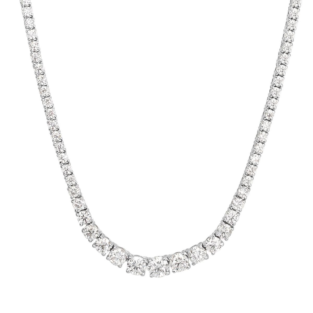 This gorgeous diamond tennis necklace showcases 6.65ct of exceptionally bright round brilliant cut diamonds graded at top colors of G-H and SI1-SI2 clarities. They are set in a classic 18k white gold, graduated setting style. Truly elegant and