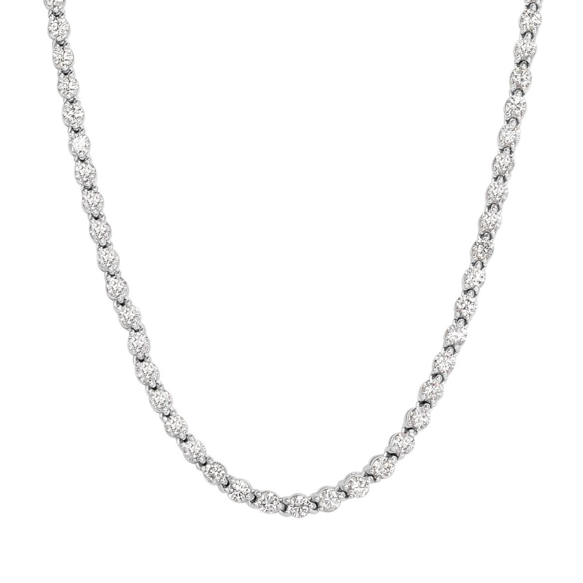 This superb diamond tennis necklace showcases 7.58ct of round brilliant cut diamonds graded at top qualities of F-G in color, SI1-SI2 in clarity. They are matched to perfection and set in a classic four-prong, 18k white gold setting.