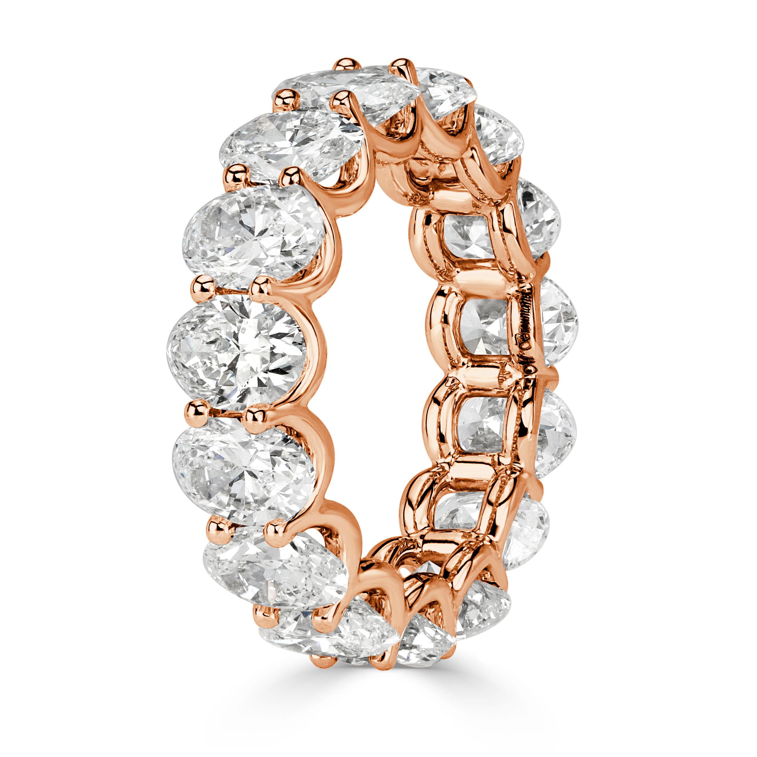 Custom created in 18k rose gold, this dazzling diamond eternity band shaowcases 7.64ct of oval cut diamonds graded at E-F, VS1-VS2. They are seemlessly matched and set in a U-prong setting style with hardly any metal showing. All eternity bands are