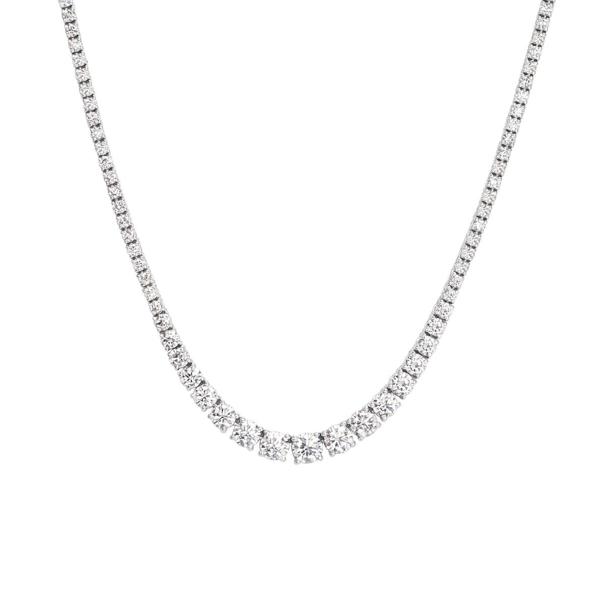 This gorgeous diamond tennis necklace showcases 7.75 ct of round brilliant cut diamonds arranged in a custom graduating setting style. They are remarquably white and sparkle tremendously! They are graded at F-G in color, VS2-SI2 in clarity and set