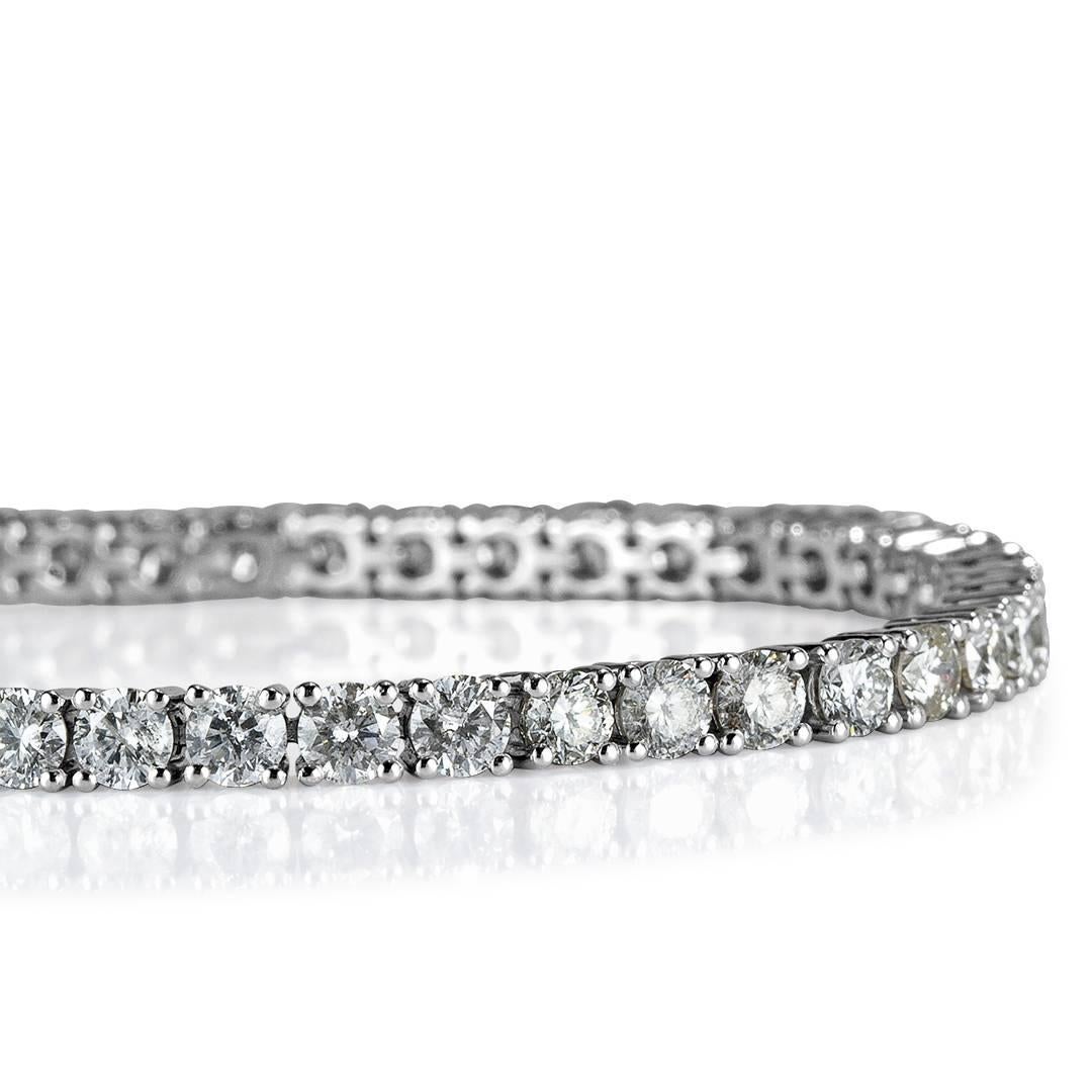 This beautiful and timeless diamond tennis bracelet is set with 8.90ct of round brilliant cut diamonds hand set in 14k white gold. The diamonds are graded at F-G, SI1-SI2.