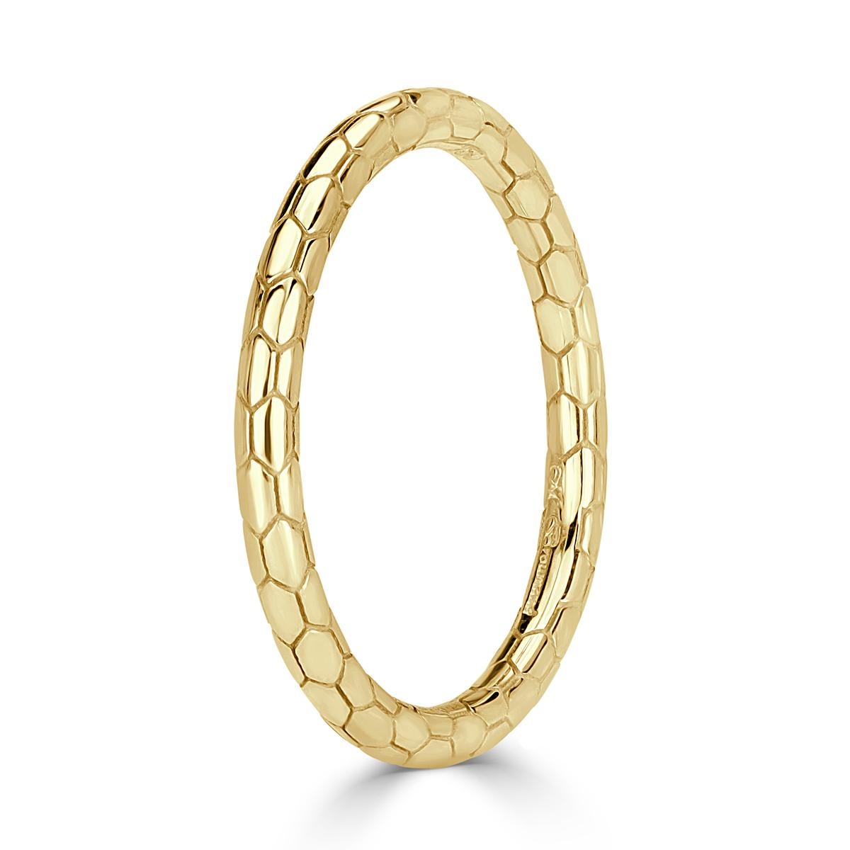 Custom created in 18k yellow gold, this stylish and feminine wedding band showcases a ravishing scale design throughout. It also comes in 18k rose, white gold and platinum.