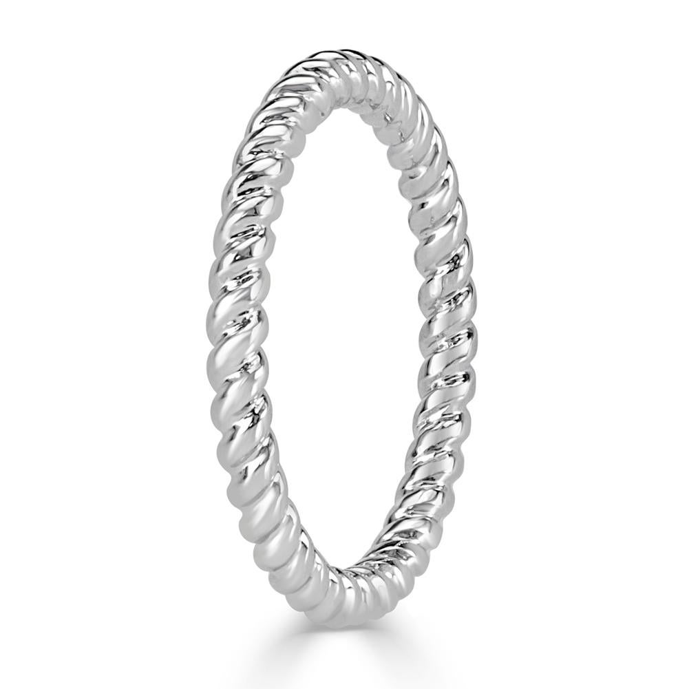 This beautiful 18k white gold band is subtle and unique. Created with a twisted rope design, it is a great addition to any ring stack. It pairs wonderfully with engagement rings and has enough presence as stand-alone piece.  