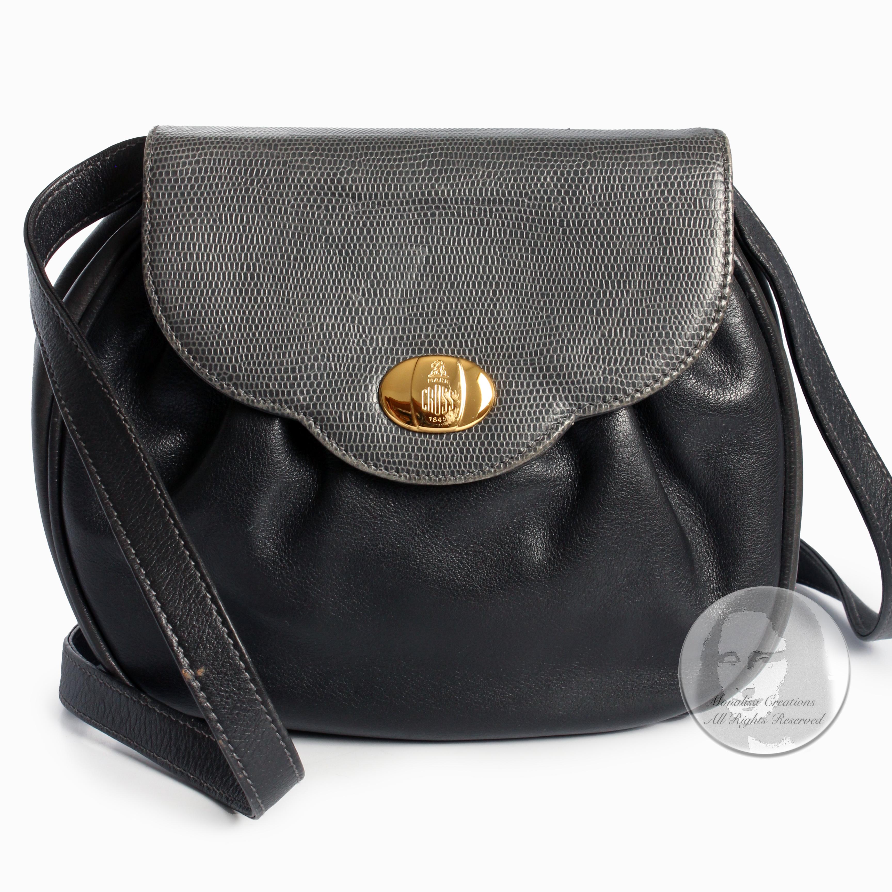 Authentic, preowned, vintage Mark Cross clutch or convertible crossbody bag, likely made in the 90s. Made from black leather with a lizard embossed top flap, it features a magnetic clasp, and a non-adjustable and non-removable strap that can be