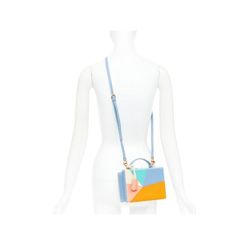 MARK CROSS Grace 18 blue multicolor calfskin patchwork crossbody vanity box bag
Reference: TGAS/F00335
Brand: Mark Cross
Model: Grace 18
Material: Leather
Color: Blue, Multicolour
Pattern: Solid
Closure: Push Lock
Lining: Red Leather
Extra Details: