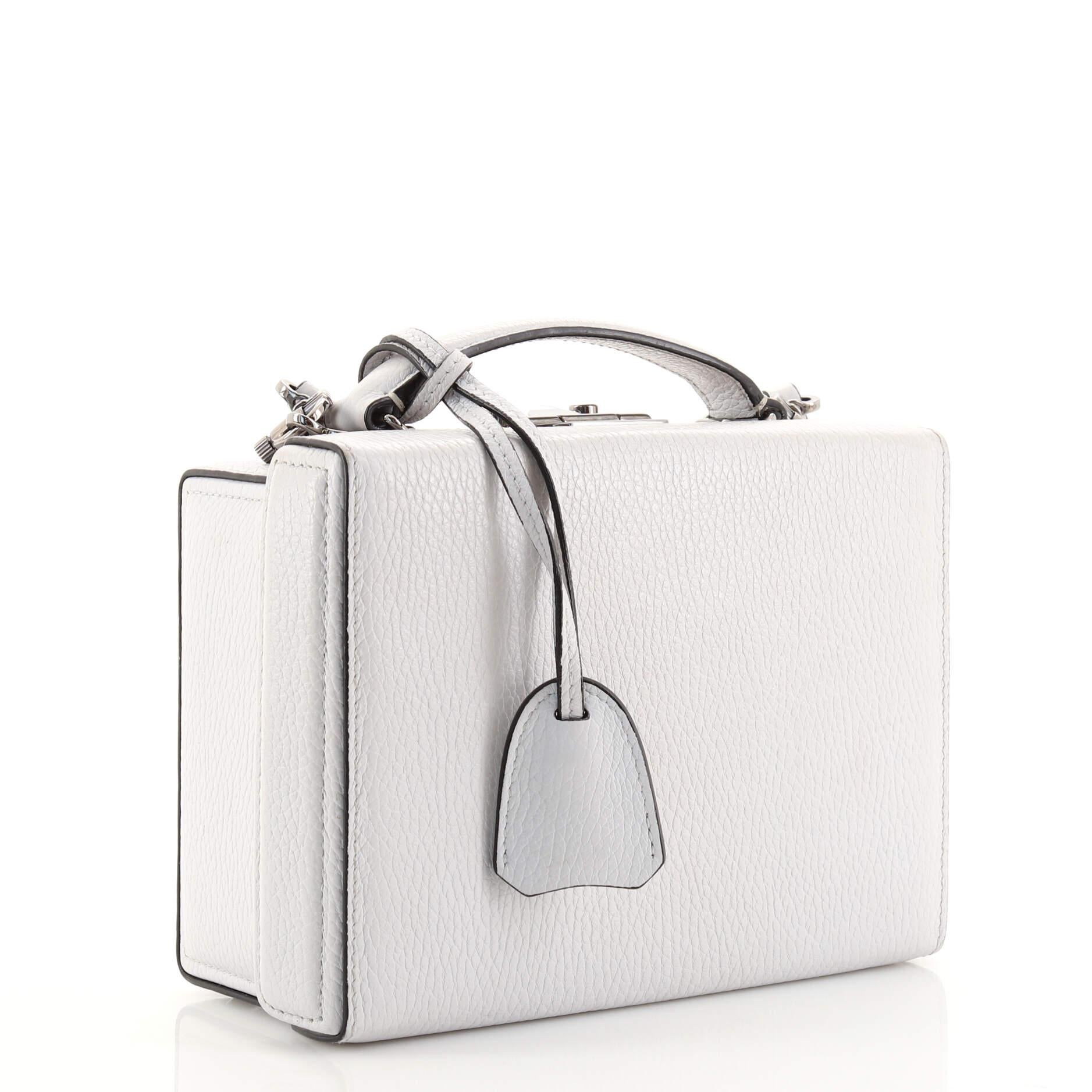 Condition: Very good. Odor in interior. Darkening, wear and small marks on exterior, cracking on side opening wax edges. Moderate scuffs and indentations in interior, scratches on hardware.
Accessories: Clochette, Keys, With Strap
Measurements: