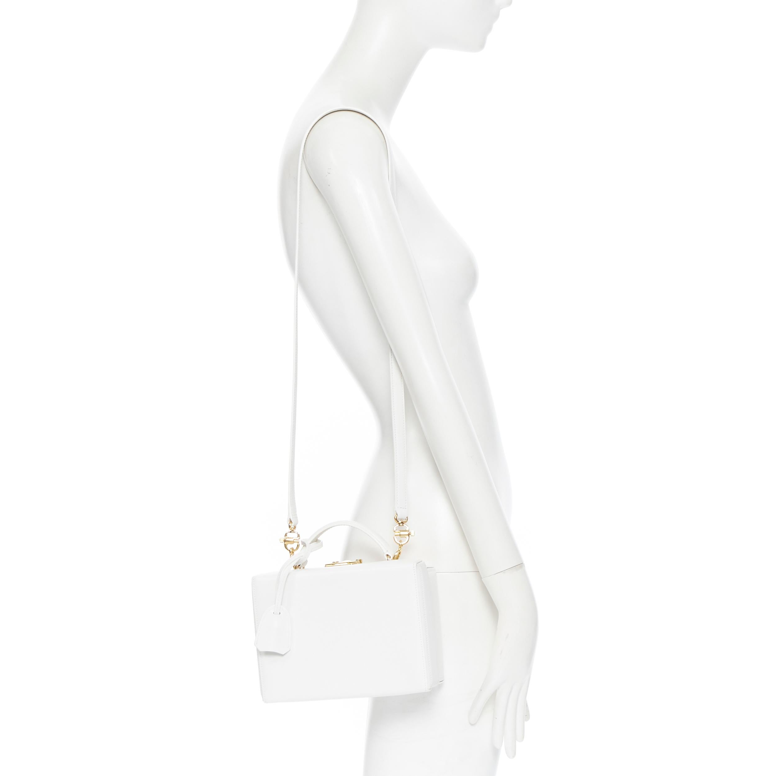 MARK CROSS Small Grace white leather gold top handle satchel vanity box bag
Brand: Mark Cross
Designer: Mark Cross
Model Name / Style: Small Grace 
Material: Leather
Color: White
Pattern: Solid
Closure: Clasp
Extra Detail: Grace Small bag. White