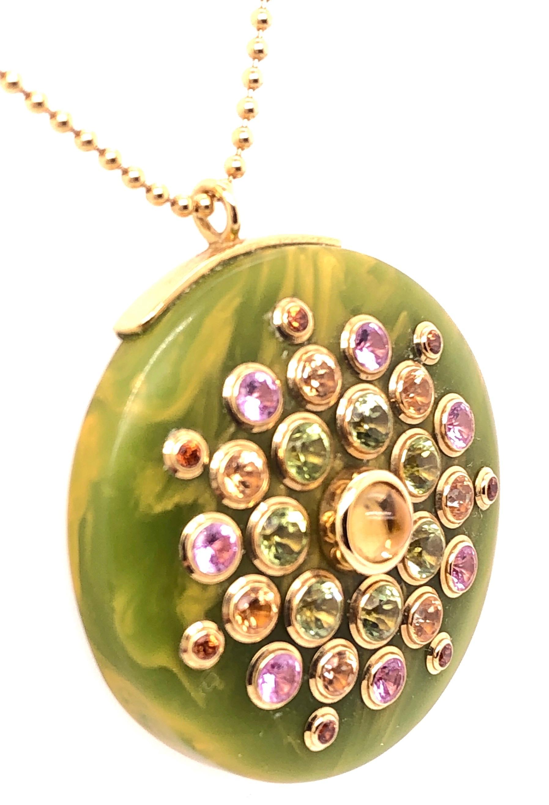 Mark Davis 18Kt Yellow Gold Necklace with Jeweled Pendant
In the hands of Mark Davis, the combination of vintage bakelite, diamonds, gemstones and precious metals yields a singular assortment of collectible contemporary jewelry. Every item is