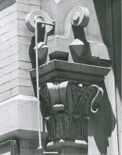 untitled, black and white photograph of a capital on a New York City column 