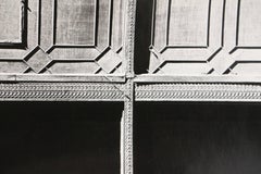 untitled, black and white photo of architecture on facade of a building in NYC