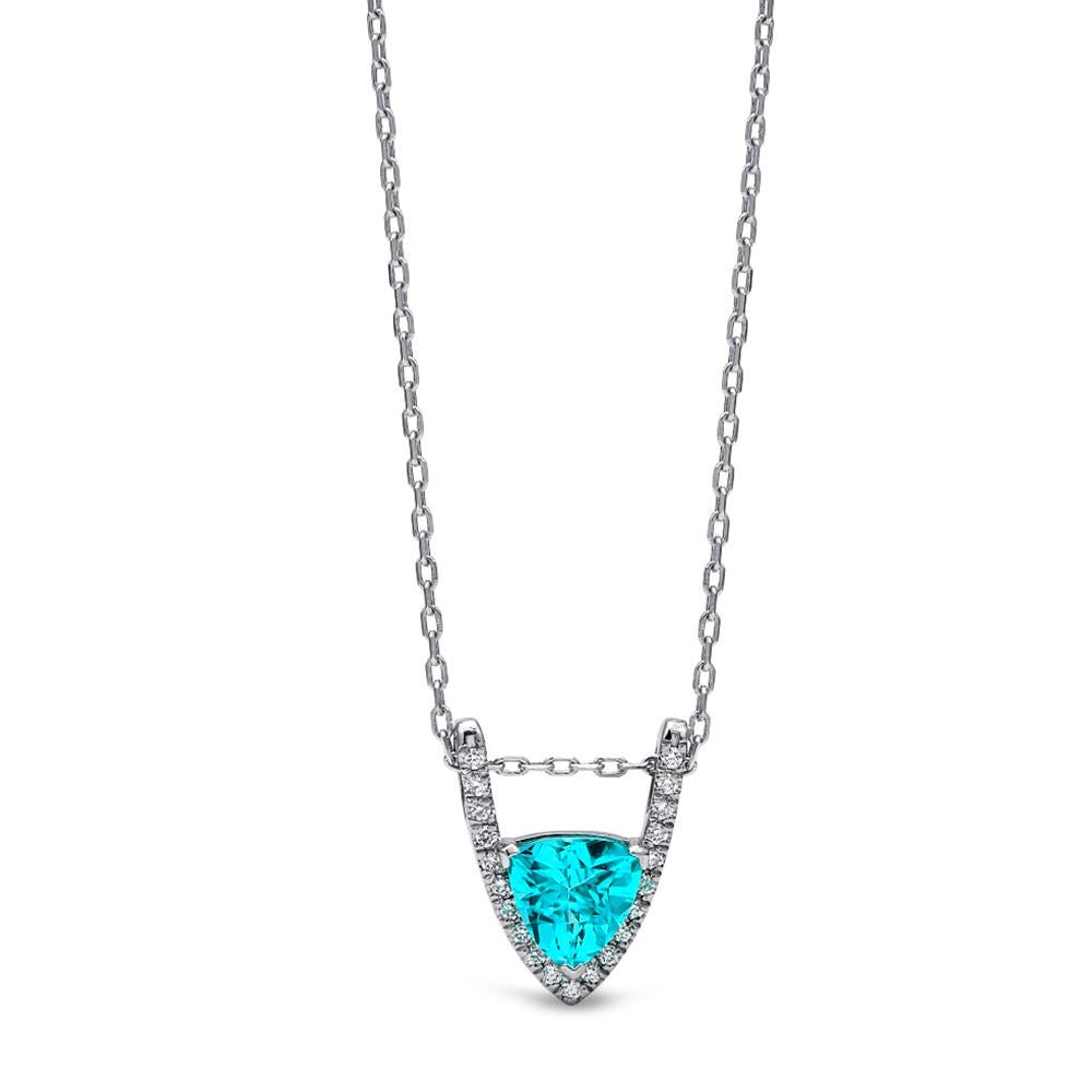 Resting along the interior of this magnificent V-shaped design is a dazzling trillion shaped Paraiba tourmaline exhibiting its electric hues as it lays secure in its prongs. The 1.60 carat Paraiba is of Mozambique origin. A row of dazzling diamonds