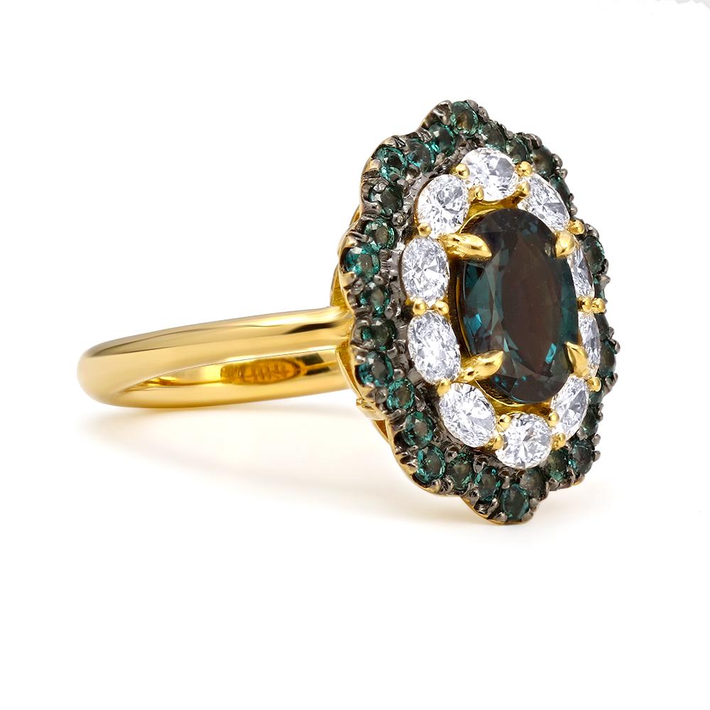 An alexandrite is prized for its natural ability to shift colors from a vibrant bluish-green under daylight to an alluring reddish-purple under incandescent light. Originally known as 'Emerald by day and Ruby by Night', the Russian source depleted