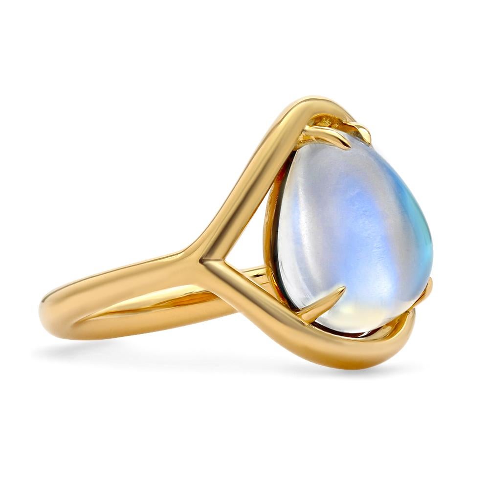 A glimmering one-of-a-kind moonstone rests at the heart of this organic, free flowing design that features lustrous gold elegantly wrapping the contours of the pear shape center stone. Thanks to its minimal and timeless design, it'll seamlessly find