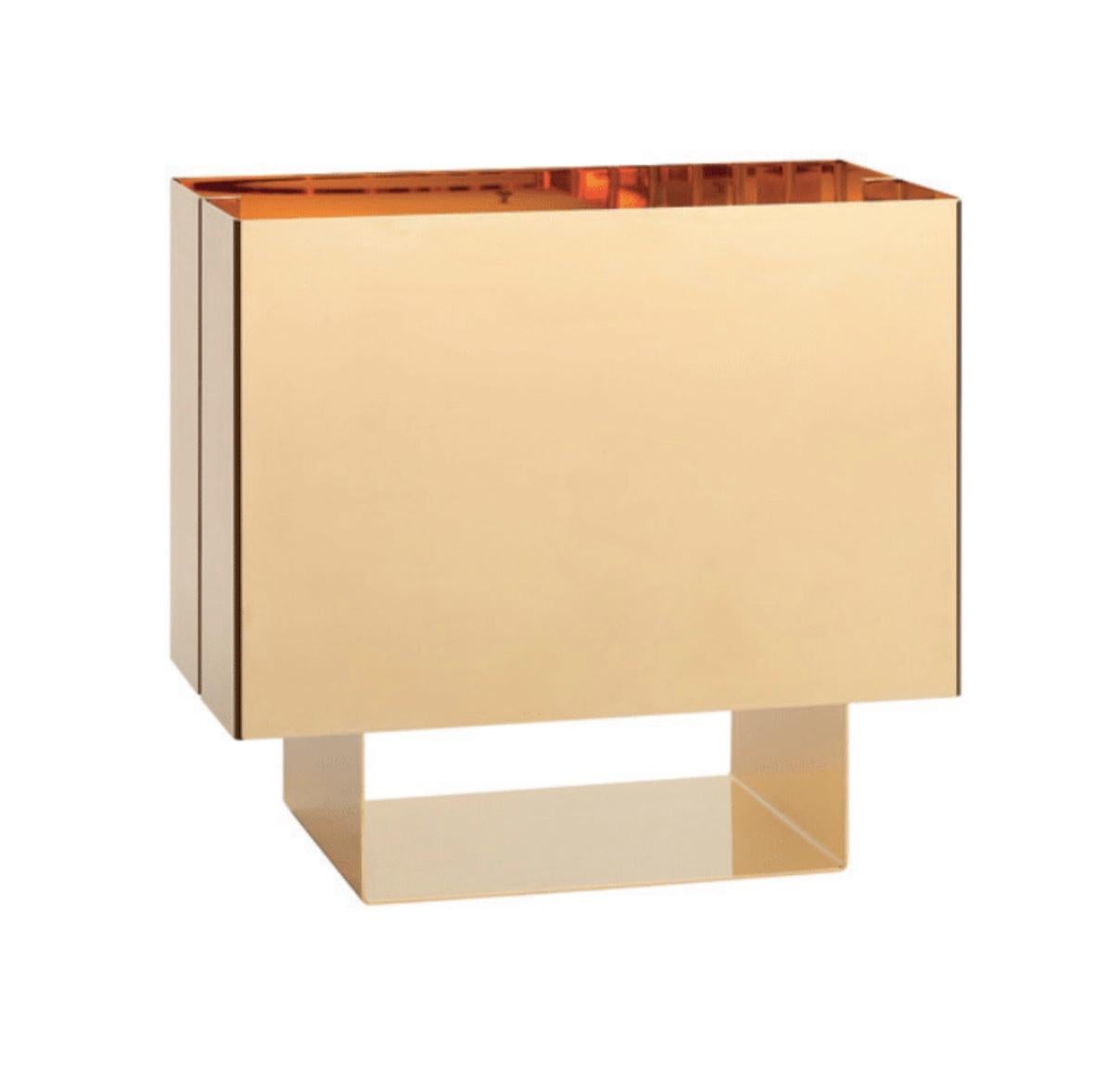 Mark Holmes 'SEAM ONE' table lamp in 24K gold finish for E15 Selected. Designed in 2003, New Production.

To visually signify the company’s 10th anniversary, in 2006 e15 exchanged the e15 signal orange with gold. It symbolised the censure after