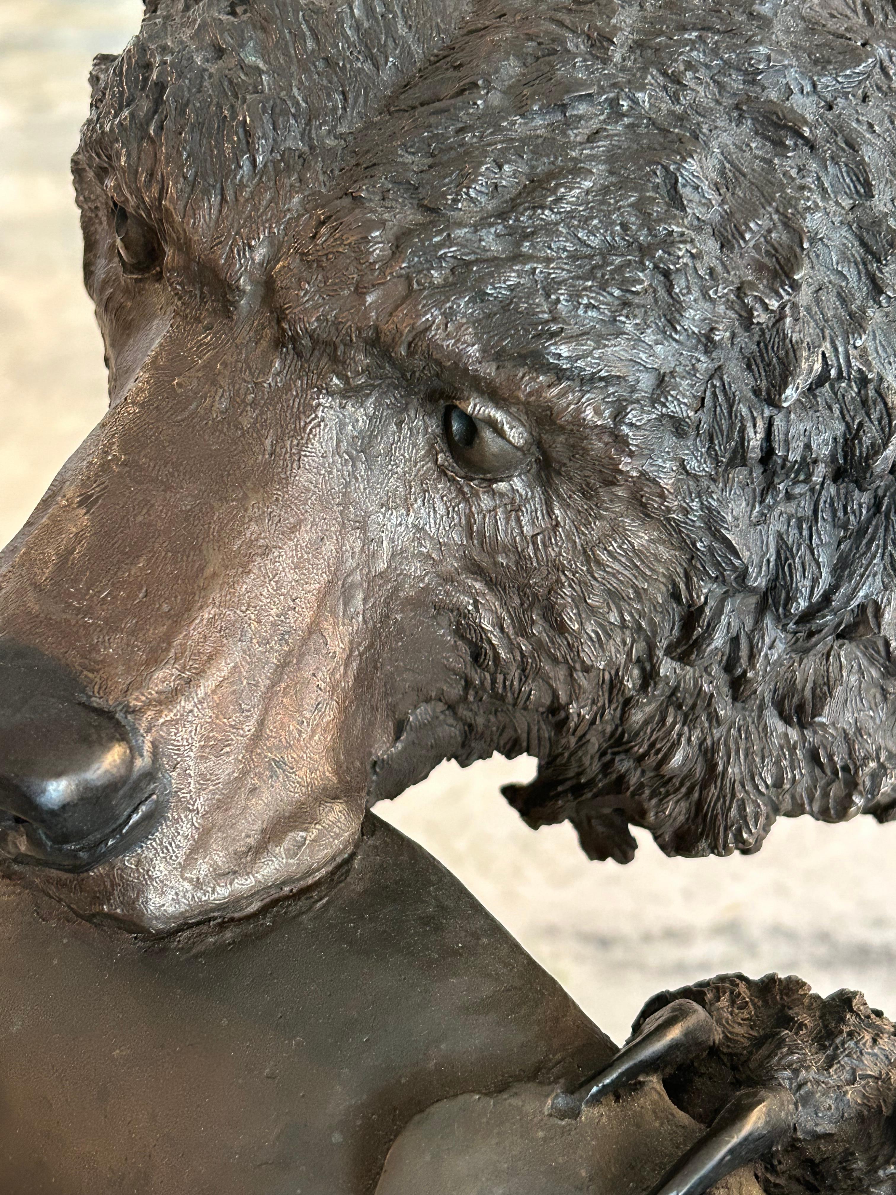 Mark Hopkins, bronze titled “Fishing Grizzly”.grizzly bear with rainbow trout 3
