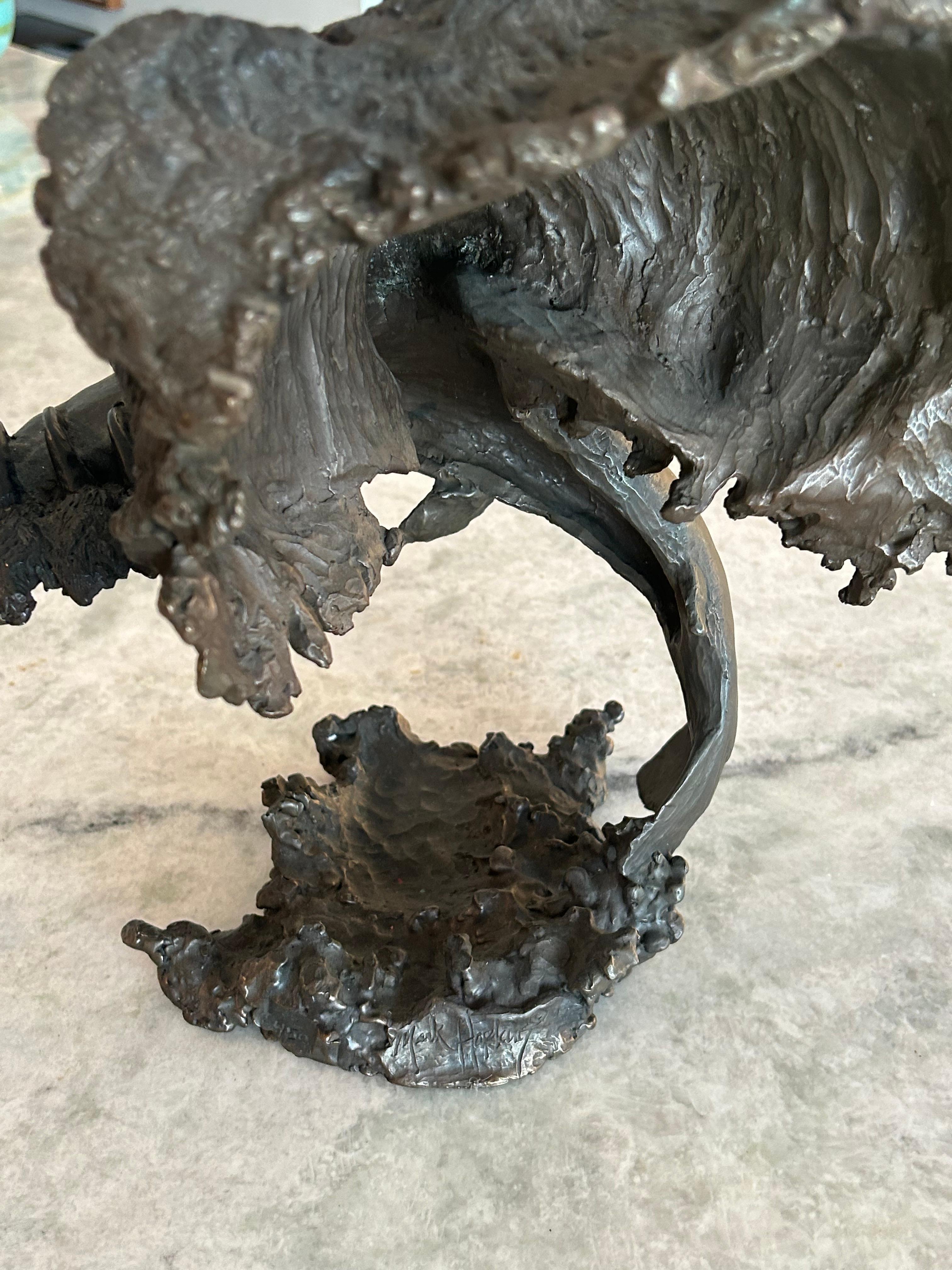 Mark Hopkins, bronze titled “Fishing Grizzly”.grizzly bear with rainbow trout 4